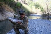 Uzbekistan rainbow trout fishing in Kok-su river.